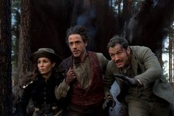 Noomi Rapace, Robert Downey Jr. and Jude Law in Top Action Movie Sherlock Holmes: A Game of Shadows