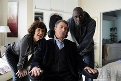 Anne Le Ny, François Cluzet and Omar Sy in one of the top dramas movies of 2012, The Intouchables