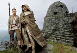 Rey (Daisy Ridley) meets Luke Skywalker (Mark Hamill) but the reclusive Jedi Master is battling his own demons and failures in the top 2017 sci-fi fantasy film Star Wars: The Last Jedi.